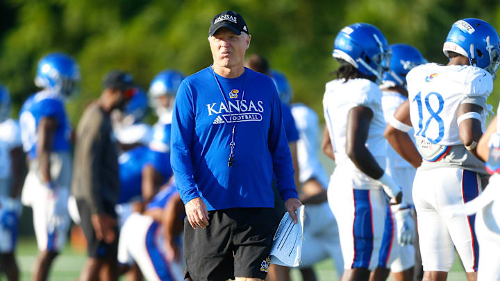 Kansas defensive coordinator Brian Borland walks the field during a practice in 2021 at the University of Kansas.