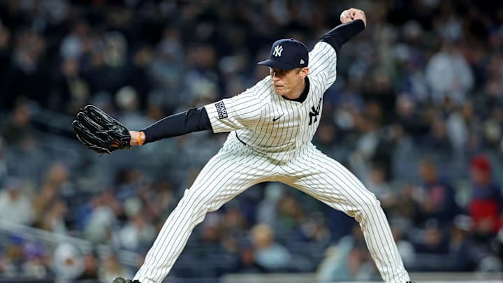 Oct 14, 2024; Bronx, New York, USA; New York Yankees pitcher Tim Hill (54) pitches during the eighth inning against the Cleveland Guardians in game one of the ALCS for the 2024 MLB Playoffs at Yankee Stadium. Mandatory Credit: Brad Penner-Imagn Images Oct 14, 2024; Bronx, New York, USA; New York Yankees pitcher Tim Hill (54) pitches during the eighth inning against the Cleveland Guardians in game one of the ALCS for the 2024 MLB Playoffs at Yankee Stadium. Mandatory Credit: Brad Penner-Imagn Images