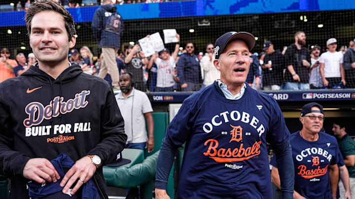 Detroit Tigers president of baseball operations Scott Harris, left, and owner Christopher Ilitch celebrate the 6-3 win over the Cleveland Guardians in Game 3 of the AL wild-card series at Progressive Field in Cleveland on Thursday, Oct. 2, 2025.