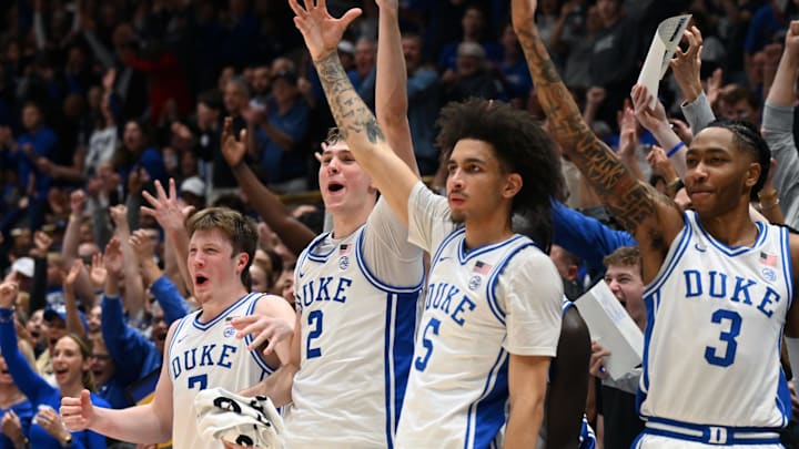 Mar 3, 2025; Durham, North Carolina, USA;  Duke Blue Devils forward Kon Knueppel (7) forward Cooper Flagg (2) guard Tyrese Proctor (5) and forward Isaiah Evans (3) react during the second half against the Wake Forest Demon Deacons at Cameron Indoor Stadium.  The Blue Devils won 93-60. Mandatory Credit: Rob Kinnan-Imagn Images