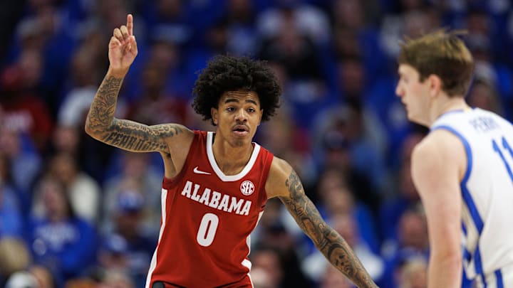 Jan 18, 2025; Lexington, Kentucky, USA; Alabama Crimson Tide guard Labaron Philon (0) defends against Kentucky Wildcats guard Travis Perry (11) during the first half at Rupp Arena at Central Bank Center. Mandatory Credit: Jordan Prather-Imagn Images Jan 18, 2025; Lexington, Kentucky, USA; Alabama Crimson Tide guard Labaron Philon (0) defends against Kentucky Wildcats guard Travis Perry (11) during the first half at Rupp Arena at Central Bank Center. Mandatory Credit: Jordan Prather-Imagn Images
