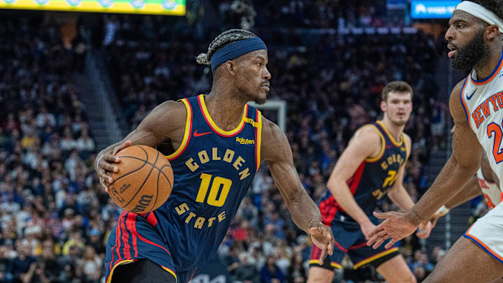 Mar 15, 2025; San Francisco, California, USA; Golden State Warriors forward Jimmy Butler III (10) drives to the net against the New York Knicks during the fourth quarter at Chase Center. Mandatory Credit: Neville E. Guard-Imagn Images