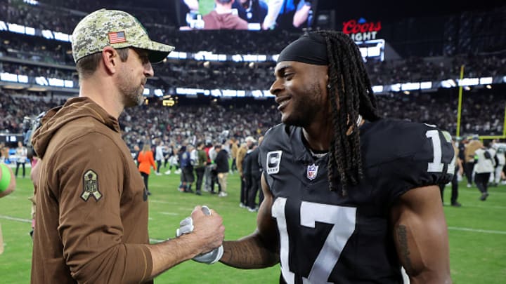 New York Jets quarterback Aaron Rodgers speaks with Las Vegas Raiders wide receiver Davante Adams after a November 2023 game at Allegiant Stadium on November 12, 2023 in Las Vegas, Nevada.