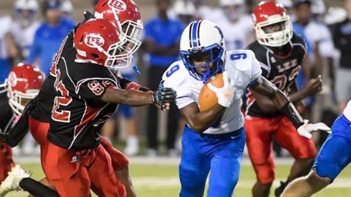 Auburn High School s Ean Nation (9) carries against Lee during their game at Cramton Bowl in Montgomery, Ala., on Thursday September 15, 2022. Auburn High School s Ean Nation (9) carries against Lee during their game at Cramton Bowl in Montgomery, Ala., on Thursday September 15, 2022.