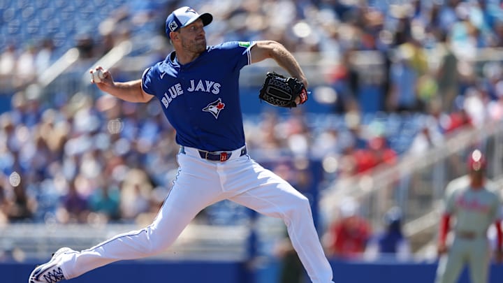 Mar 2, 2025; Dunedin, Florida, USA; Toronto Blue Jays pitcher Max Scherzer (31) throws a pitch against the Philadelphia Phillies in the first inning during spring training at TD Ballpark. Mandatory Credit: Nathan Ray Seebeck-Imagn Images