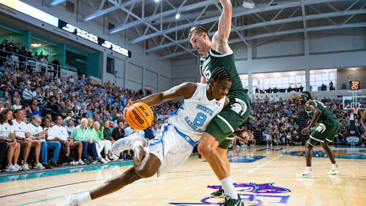 The Michigan State Spartans compete against the North Carolina Tar Heels in the Fort Myers Tip-Off Beach Division game at Suncoast Credit Union Arena on Fort Myers, Fla., on Thursday, Nov. 27, 2025.