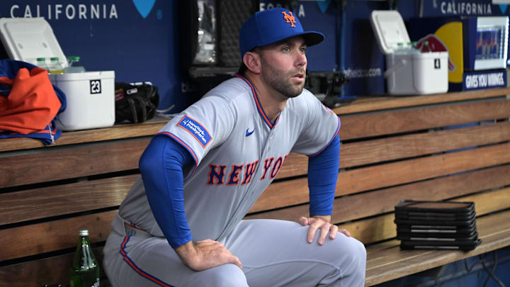 Apr 13, 2026; Los Angeles, California, USA;  New York Mets pitcher David Peterson (23) in the dugout prior to the game against the Los Angeles Dodgers at Dodger Stadium. Mandatory Credit: Jayne Kamin-Oncea-Imagn Images