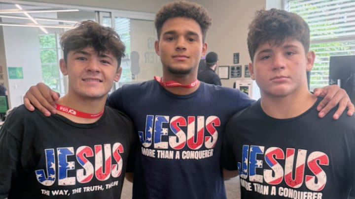 Jayden O'Farrill (right) with Bishop McCort teammates and Junior Fargo Champs, Bo Bassett (left) and Melvin Miller (center).