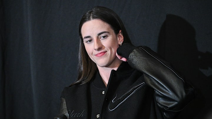 Feb 2, 2025; Iowa City, Iowa, USA; Former Iowa Hawkeyes player Caitlin Clark talks with the media before the game against the USC Trojans at Carver-Hawkeye Arena. The Hawkeyes will be retiring the jersey of Clark after the game. Mandatory Credit: Jeffrey Becker-Imagn Images