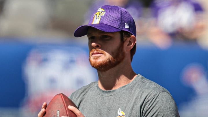 Sep 8, 2024; East Rutherford, New Jersey, USA; Minnesota Vikings quarterback Sam Darnold (14) warms up before the game against the New York Giants at MetLife Stadium. Sep 8, 2024; East Rutherford, New Jersey, USA; Minnesota Vikings quarterback Sam Darnold (14) warms up before the game against the New York Giants at MetLife Stadium.