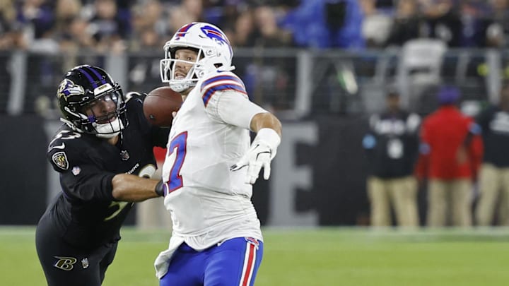 Baltimore Ravens linebacker Kyle Van Noy (53) strips the ball from Buffalo Bills quarterback Josh Allen (17) while attempting to pass the ball during the third quarter at M&T Bank Stadium.