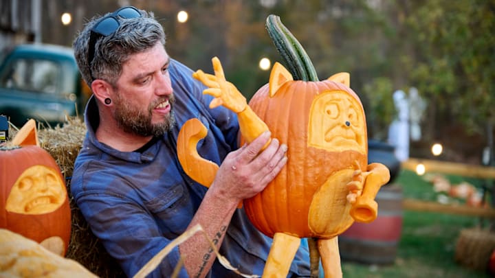 Contestant Titus Arensberg working on creation for the 501 carve as seen on Outrageous Pumpkins, Season 5.