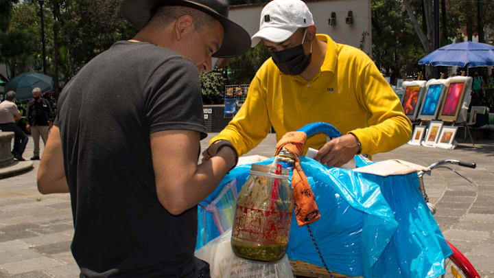 Tacos de canasta are often sold by mobile vendors