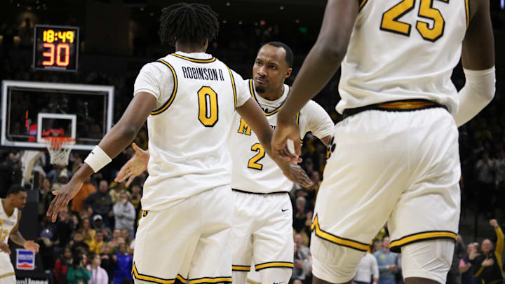 Feb. 19, 2025; Columbia, Missouri, USA; Missouri Tigers guard Anthony Robinson II (0), Tamar Bates (0) and forward Mark Mitchell (25) celebrate against the Alabama Crimson Tide at Mizzou Arena. 