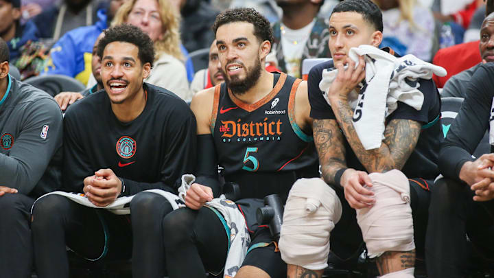 Jan 13, 2024; Atlanta, Georgia, USA; Washington Wizards guard Jordan Poole (13) and guard Tyus Jones