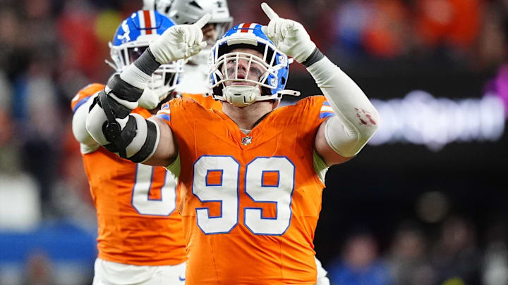 Nov 6, 2025; Denver, Colorado, USA; Denver Broncos defensive end Zach Allen (99) reacts against the Las Vegas Raiders during the first half at Empower Field at Mile High. 