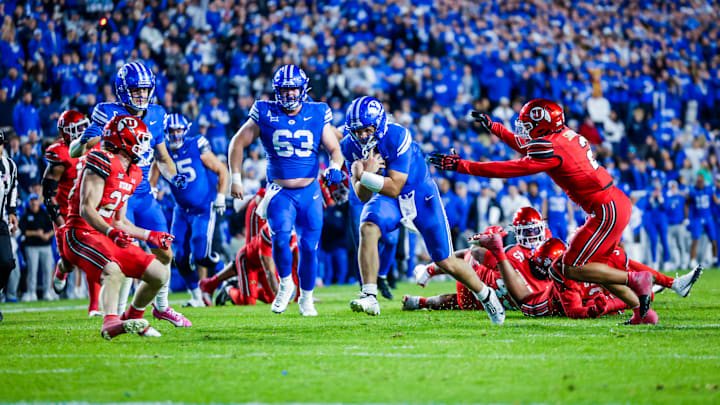 BYU quarterback Bear Bachmeier scores a touchdown against Utah