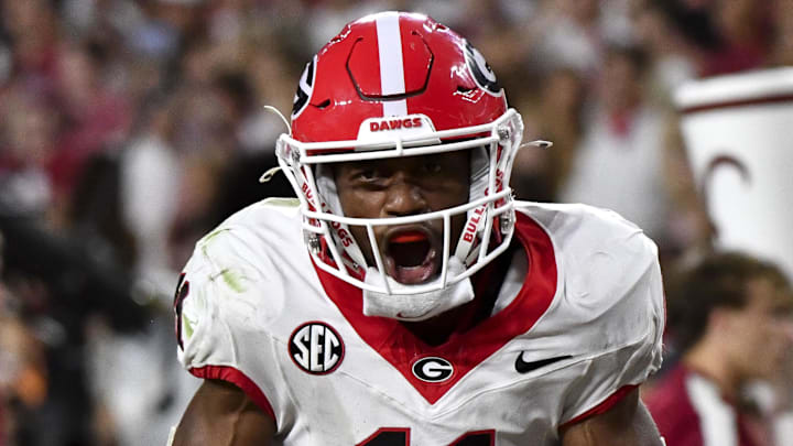 aSep 28, 2024; Tuscaloosa, Alabama, USA;  Georgia Bulldogs wide receiver Arian Smith (11) celebrates after making a catch against the Alabama Crimson Tide that set up a touchdown at Bryant-Denny Stadium. Alabama defeated Georgia 41-34. Mandatory Credit: Gary Cosby Jr.-Imagn Images