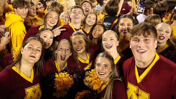 Oct 5, 2024; Minneapolis, Minnesota, USA; Minnesota Golden Gophers cheerleaders celebrate on the field after the game against the USC Trojans at Huntington Bank Stadium. Mandatory Credit: Matt Krohn-Imagn Images Oct 5, 2024; Minneapolis, Minnesota, USA; Minnesota Golden Gophers cheerleaders celebrate on the field after the game against the USC Trojans at Huntington Bank Stadium. Mandatory Credit: Matt Krohn-Imagn Images