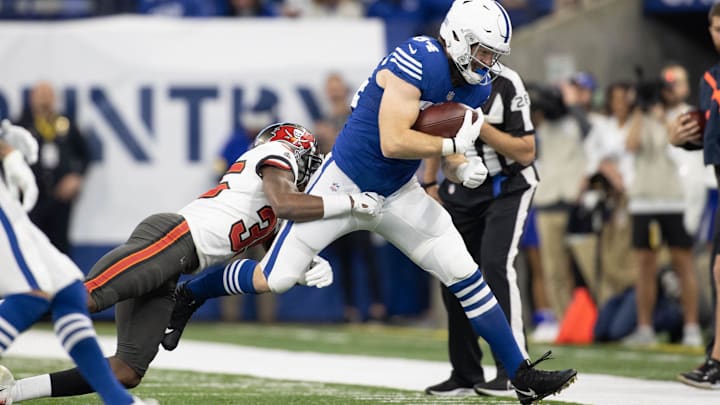 Nov 28, 2021; Indianapolis, Indiana, USA; Indianapolis Colts tight end Jack Doyle (84) catches the ball while Tampa Bay Buccaneers cornerback Jamel Dean (35) defends in the first quarter at Lucas Oil Stadium. Mandatory Credit: Trevor Ruszkowski-Imagn Images Nov 28, 2021; Indianapolis, Indiana, USA; Indianapolis Colts tight end Jack Doyle (84) catches the ball while Tampa Bay Buccaneers cornerback Jamel Dean (35) defends in the first quarter at Lucas Oil Stadium. Mandatory Credit: Trevor Ruszkowski-Imagn Images