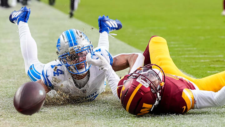 Washington Commanders cornerback Jonathan Jones (31) blocks a pass intended for Detroit Lions wide receiver Amon-Ra St. Brown (14) during the first half at Northwest Stadium in Landover, Md. on Sunday, November 9, 2025.