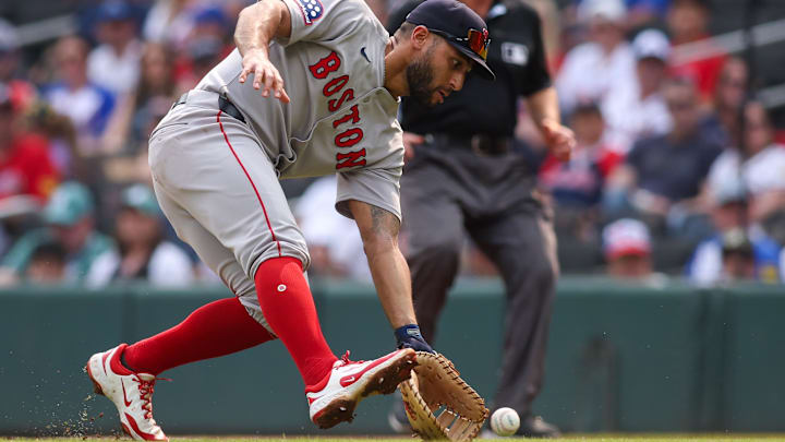 May 31, 2025; Atlanta, Georgia, USA; Boston Red Sox first baseman Abraham Toro (29) fields a ground ball against the Atlanta Braves in the second inning at Truist Park. Mandatory Credit: Brett Davis-Imagn Images
