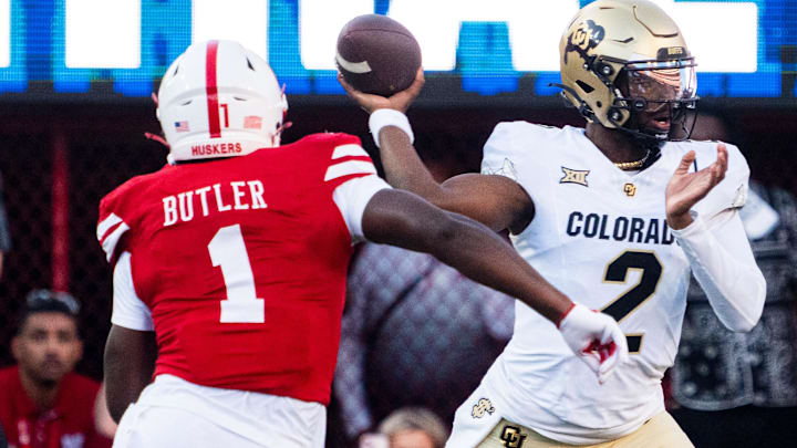 Nebraska's Jimari Butler applies pressure to Colorado quarterback Shedeur Sanders on Sep 7, 2024, in Lincoln. Nebraska's Jimari Butler applies pressure to Colorado quarterback Shedeur Sanders on Sep 7, 2024, in Lincoln.