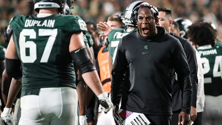 Michigan State head coach Mel Tucker celebrates with players after a touchdown against Central Michigan during the second half at Spartan Stadium in East Lansing on Friday, Sept. 1, 2023.
