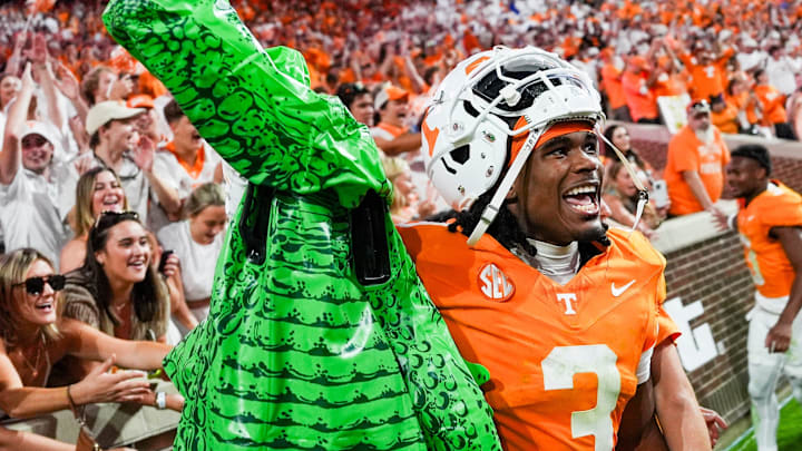 Tennessee Volunteers cornerback Jermod McCoy carries a deflated inflatable alligator after a game against the Florida Gators 