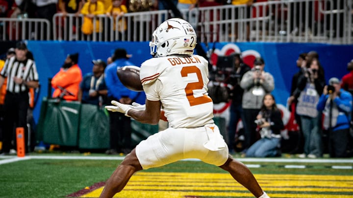 Texas Longhorns wide receiver Matthew Golden (2) catches a pass in the end zone to score during the first overtime period as the Texas Longhorns play the Arizona State Sun Devils in the Peach Bowl College Football Playoff quarterfinal at Mercedes-Benz Stadium in Atlanta, Georgia, Jan. 1, 2025.