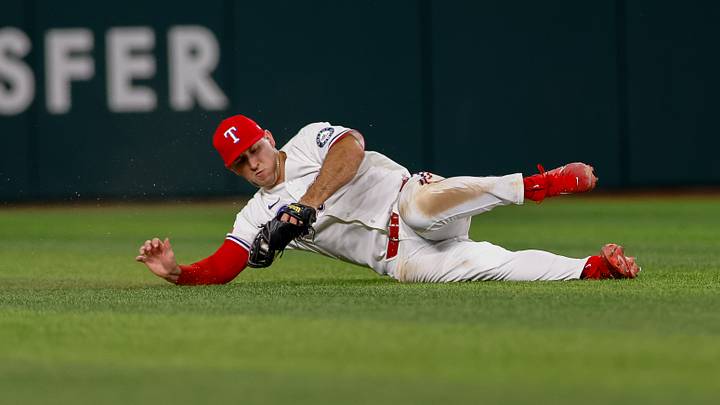 Aug 3, 2026; Arlington, Texas, USA; Texas Rangers left fielder Wyatt Langford (36) dives for a fly ball during the fifth inning against the San Francisco Giants at Globe Life Field. Mandatory Credit: Andrew Dieb-Imagn Images Aug 3, 2026; Arlington, Texas, USA; Texas Rangers left fielder Wyatt Langford (36) dives for a fly ball during the fifth inning against the San Francisco Giants at Globe Life Field. Mandatory Credit: Andrew Dieb-Imagn Images