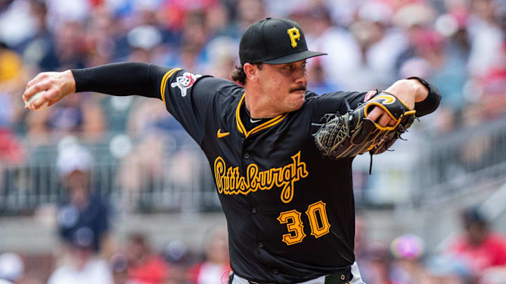 Pittsburgh Pirates pitcher Paul Skenes (30) pitches the ball against the Atlanta Braves during the fifth inning at Truist Park. 