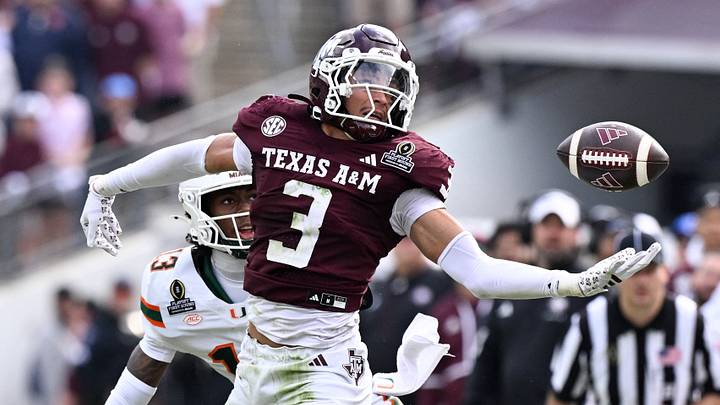Dec 20, 2025; College Station, TX, USA; Texas A&M Aggies wide receiver Ashton Bethel-Roman (3) cannot make a catch against Miami Hurricanes defensive back Bryce Fitzgerald (13) during first half of the first round game of the CFP National Playoff at Kyle Field. Mandatory Credit: Jerome Miron-Imagn Images Dec 20, 2025; College Station, TX, USA; Texas A&M Aggies wide receiver Ashton Bethel-Roman (3) cannot make a catch against Miami Hurricanes defensive back Bryce Fitzgerald (13) during first half of the first round game of the CFP National Playoff at Kyle Field. Mandatory Credit: Jerome Miron-Imagn Images