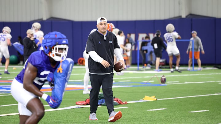 Florida Gators co-defensive coordinator and inside linebackers coach Robert Bala watches on as his unit practices during spring camp on Saturday. Florida Gators co-defensive coordinator and inside linebackers coach Robert Bala watches on as his unit practices during spring camp on Saturday.