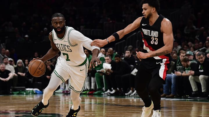 Jan 26, 2026; Boston, Massachusetts, USA; Boston Celtics guard Jaylen Brown (7) controls the ball while Portland Trail Blazers forward Toumani Camara (33) defends during the second half at TD Garden. Mandatory Credit: Bob DeChiara-Imagn Images