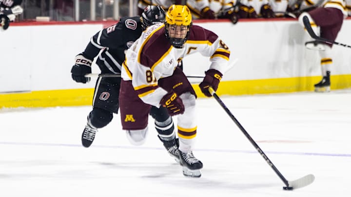 Minnesota forward Jimmy Snuggerud, front, skates with the puck against Omaha during the Ice Breaker Tournament on Oct. 12, 2024, in Las Vegas. 