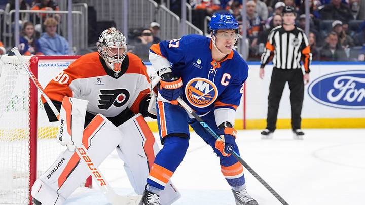 Apr 3, 2026; Elmont, New York, USA; Philadelphia Flyers goaltender Dan Vladar (80) and New York Islanders forward Anders Lee (27) wait for the puck during the second period at UBS Arena. Apr 3, 2026; Elmont, New York, USA; Philadelphia Flyers goaltender Dan Vladar (80) and New York Islanders forward Anders Lee (27) wait for the puck during the second period at UBS Arena.