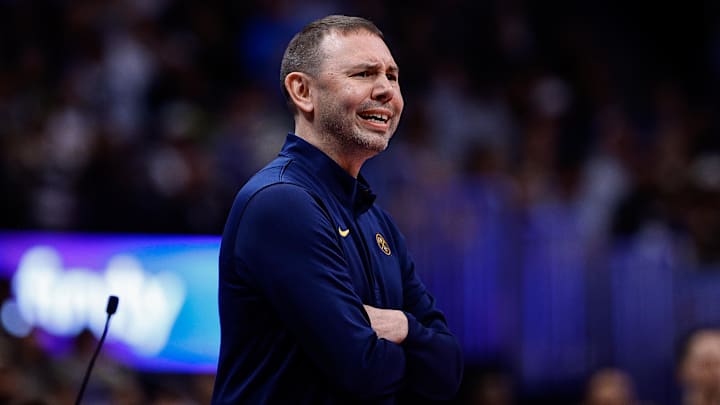 Nov 28, 2025; Denver, Colorado, USA; Denver Nuggets head coach David Adelman in the first quarter against the San Antonio Spurs at Ball Arena. Mandatory Credit: Isaiah J. Downing-Imagn Images