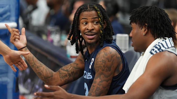 Grizzlies' Ja Morant (12) and GG Jackson II (45) talk on the bench during open practice at FedExForum in Memphis, Tenn., on Sunday, October 6, 2024.