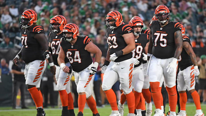 Aug 7, 2025; Philadelphia, Pennsylvania, USA; Cincinnati Bengals offensive tackle Amarius Mims (71), guard Lucas Patrick (62), center Ted Karras (64), guard Dylan Fairchild (63) and offensive tackle Orlando Brown Jr. (75) against the Philadelphia Eagles at Lincoln Financial Field. Mandatory Credit: Eric Hartline-Imagn Images