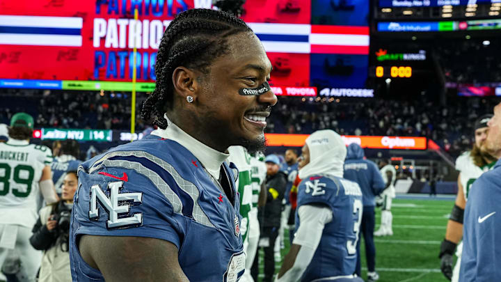 Nov 13, 2025; Foxborough, Massachusetts, USA; New England Patriots wide receiver Stefon Diggs (8) and New York Jets wide receiver John Metchie III (3) meet on the field after the game at Gillette Stadium. Mandatory Credit: David Butler II-Imagn Images
