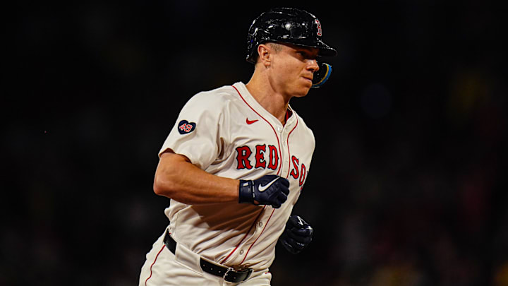 Sep 9, 2024; Boston, Massachusetts, USA; Boston Red Sox designated hitter Tyler O'Neill (17) hits a home run against the Baltimore Orioles in the eighth inning at Fenway Park. Mandatory Credit: David Butler II-Imagn Images