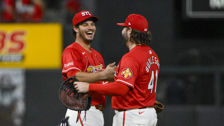 Sep 19, 2025; St. Louis, Missouri, USA;  St. Louis Cardinals third baseman Nolan Arenado (28) celebrates with first baseman Alec Burleson (41) after the Cardinals defeated the Milwaukee Brewers at Busch Stadium. Mandatory Credit: Jeff Curry-Imagn Images