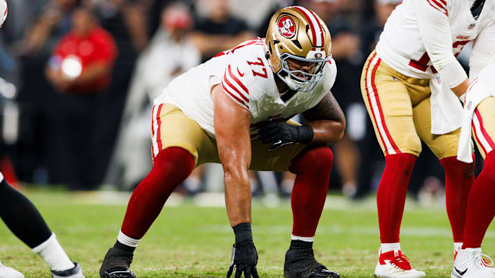 San Francisco 49ers right guard Dominick Puni (77)