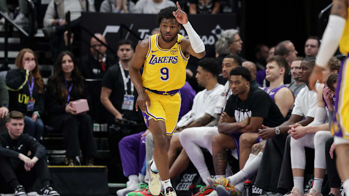 Feb 12, 2025; Salt Lake City, Utah, USA;  Los Angeles Lakers guard Bronny James (9) celebrates after making a three point basket during the second half against the Utah Jazz at Delta Center. Mandatory Credit: Chris Nicoll-Imagn Images