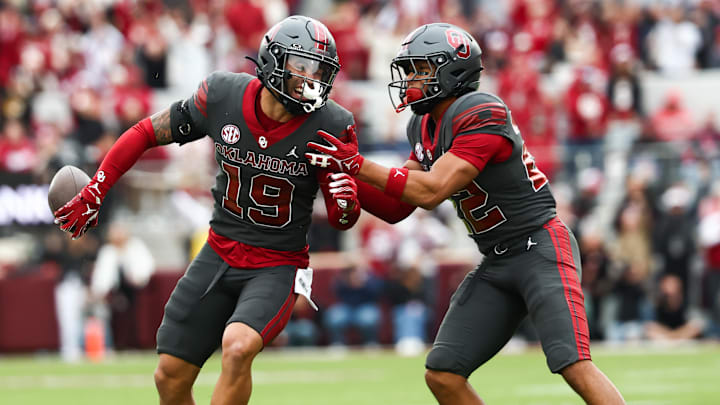 OU defensive back Jacobe Johnson (19) celebrates with defensive back Peyton Bowen (22) after intercepting a pass during the third quarter against Missouri Tigers at Gaylord Family — Oklahoma Memorial Stadium on Saturday. OU defensive back Jacobe Johnson (19) celebrates with defensive back Peyton Bowen (22) after intercepting a pass during the third quarter against Missouri Tigers at Gaylord Family — Oklahoma Memorial Stadium on Saturday.