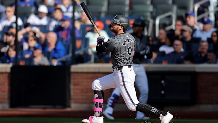 May 31, 2025; New York City, New York, USA; New York Mets left fielder Brandon Nimmo (9) follows through on a two run home run against the Colorado Rockies during the fourth inning at Citi Field. Mandatory Credit: Brad Penner-Imagn Images