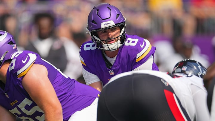 Aug 9, 2025; Minneapolis, Minnesota, USA; Minnesota Vikings quarterback Sam Howell (8) under center against the Houston Texans in the second quarter at U.S. Bank Stadium.