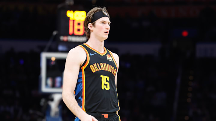 Dec 29, 2024; Oklahoma City, Oklahoma, USA; Oklahoma City Thunder center Branden Carlson (15) walks down the court during a time out against the Memphis Grizzlies during the fourth quarter at Paycom Center. Mandatory Credit: Alonzo Adams-Imagn Images