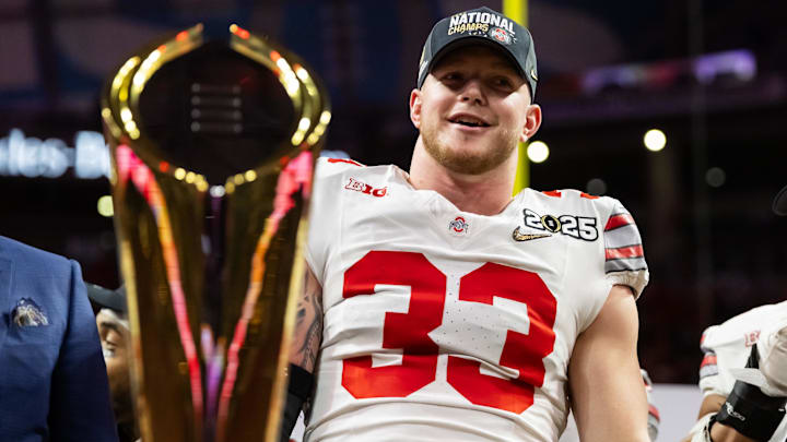 Jan 20, 2025; Atlanta, GA, USA; Ohio State Buckeyes defensive end Jack Sawyer (33) celebrates after defeating the Notre Dame Fighting Irish in the CFP National Championship.